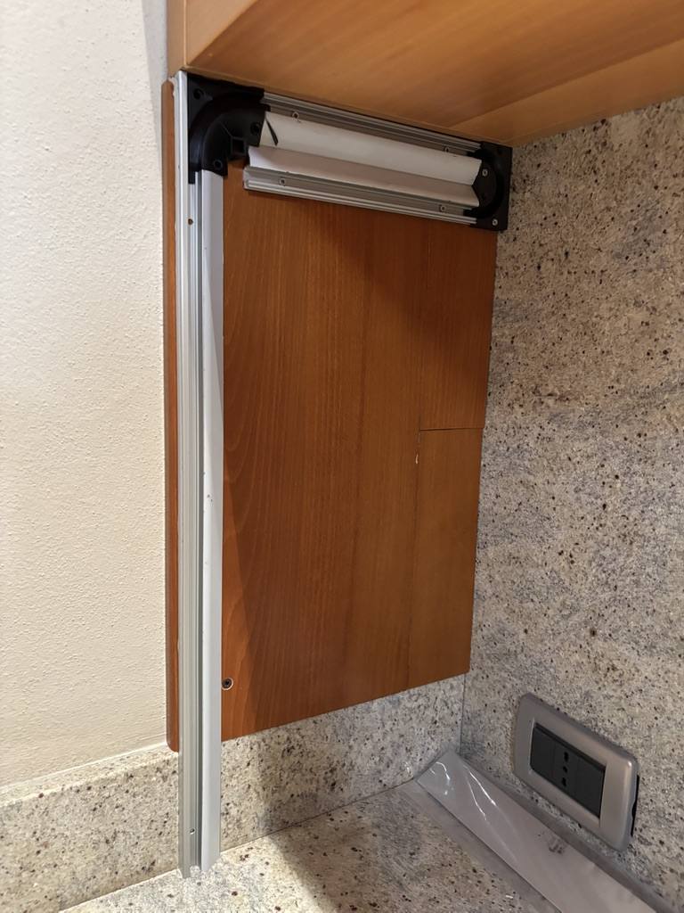 Il rullo di richiamo collegato in alto